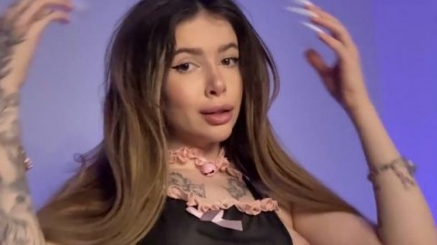 Adrianna Savu, a hot and naughty maid, demonstrates off her enormous tits, hefty bum and slutty undergarments in a sultry specta